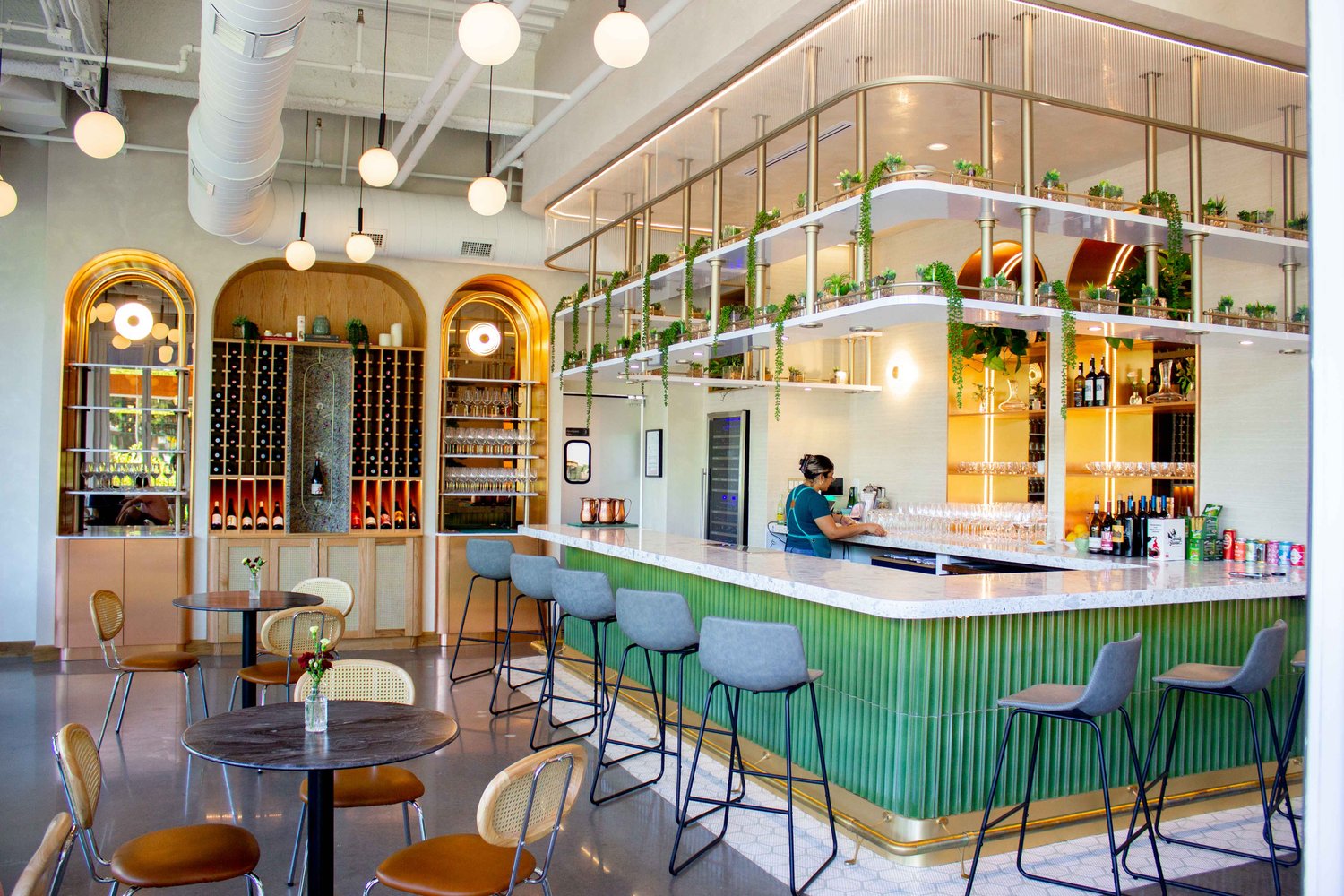 Completed hospitality bar with commercial cabinetry and architectural millwork
