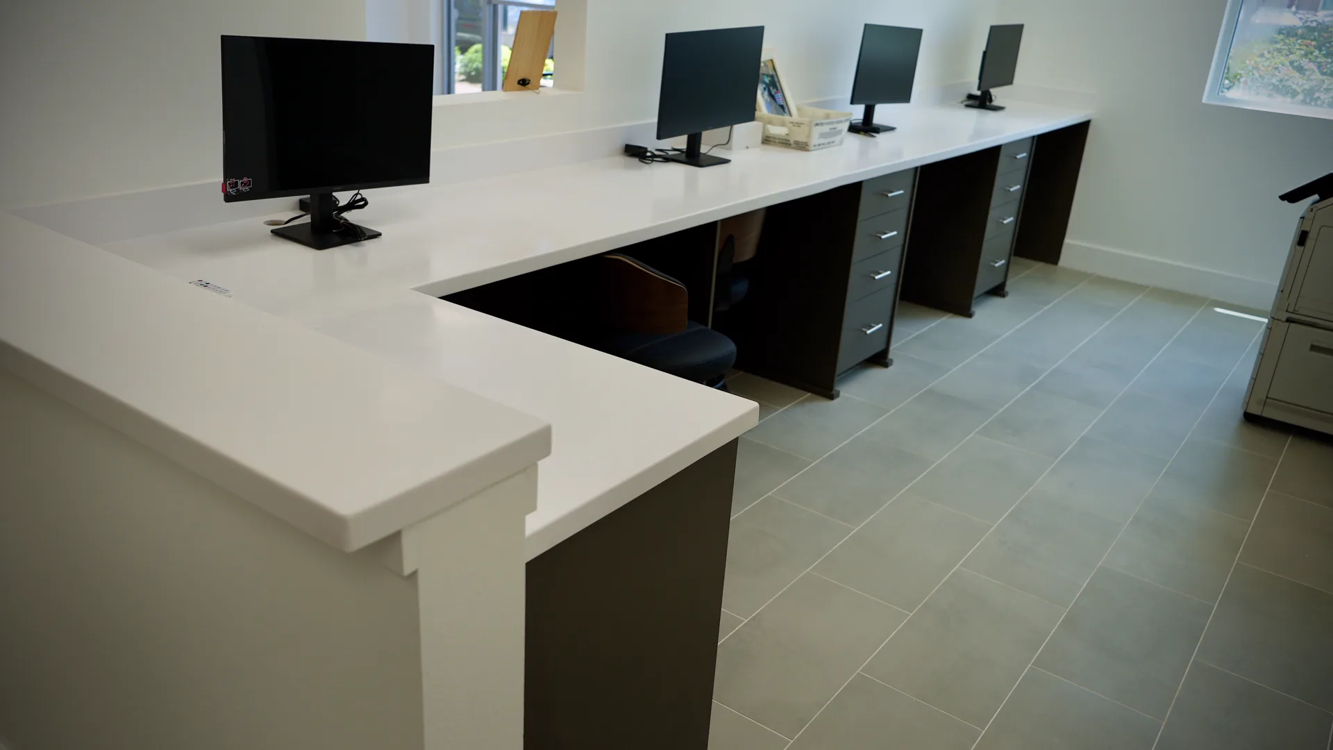 Finished healthcare work area with custom clinical cabinetry and casework